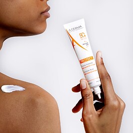 Protect - Fluide solaire visage invisible SPF50+