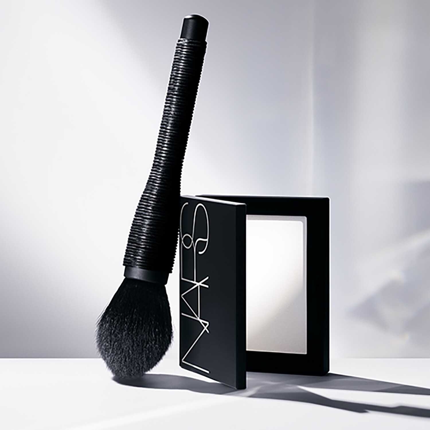 Light Reflecting Pressed Setting Powder - Mattifying Powder | NARS