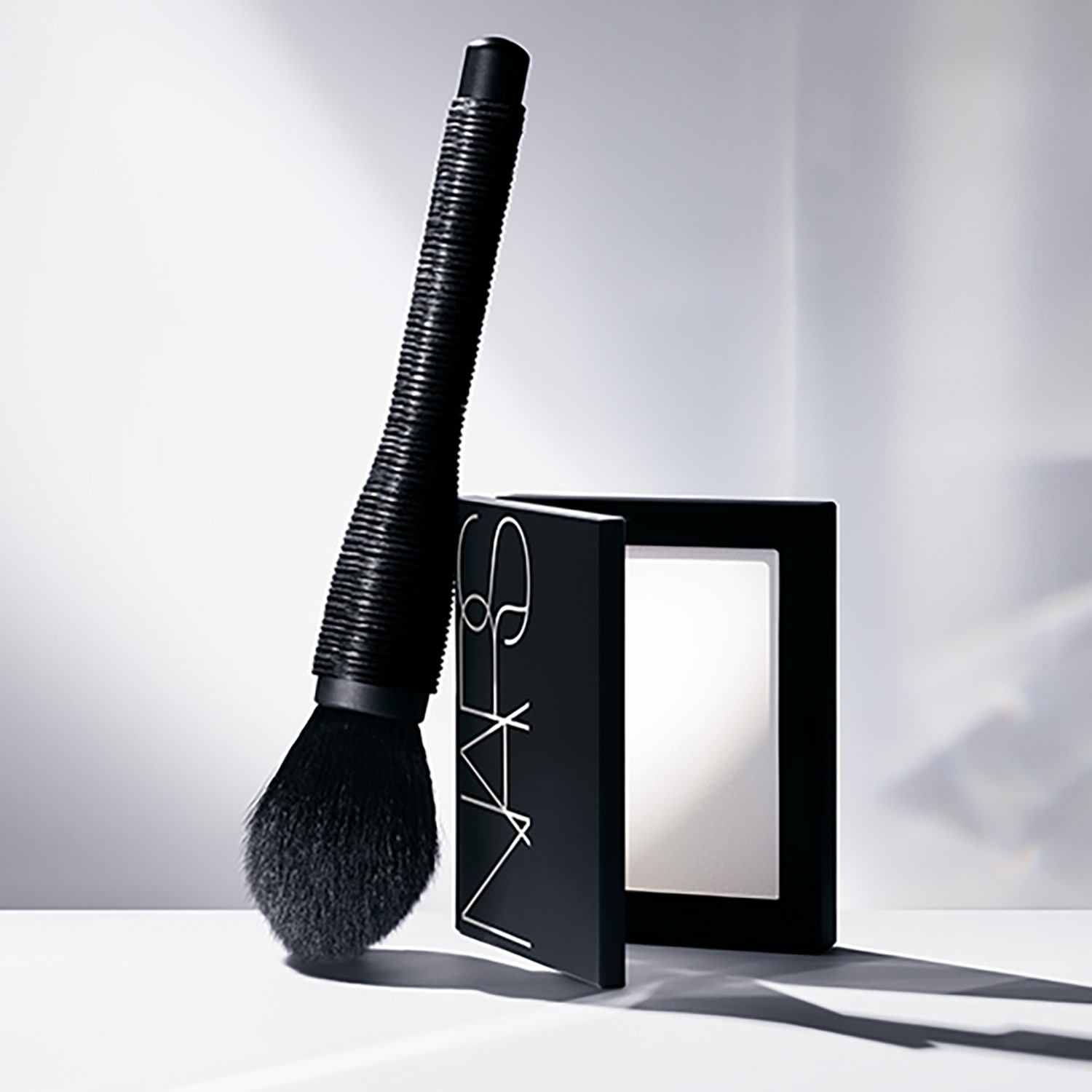 Light Reflecting Pressed Setting Powder - Mattifying Powder | NARS