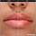 OUTRAGEOUS CHARM - Gloss Outrageous Plump effetto volume con custodia a pompon
