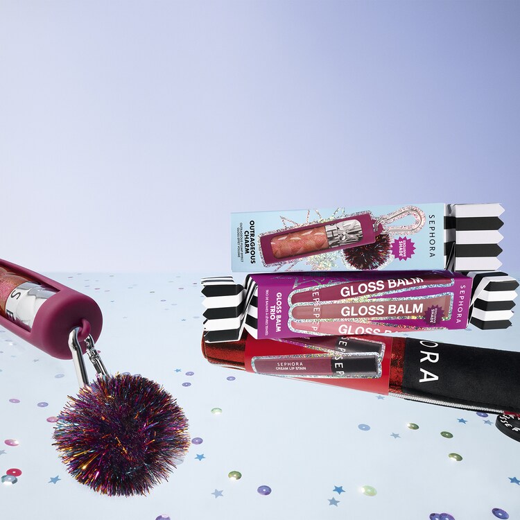 OUTRAGEOUS CHARM - Gloss Outrageous Plump effetto volume con custodia a pompon