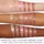 Maracuja juicy lip shimmer glass plump - Třpytivý zvětšující lesk na rty